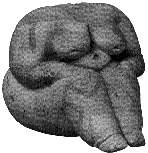 [Image: Seated
figurine]