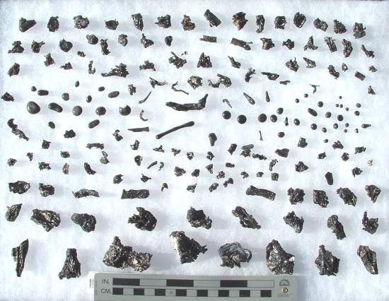 Black glass from around the Wabar crater.